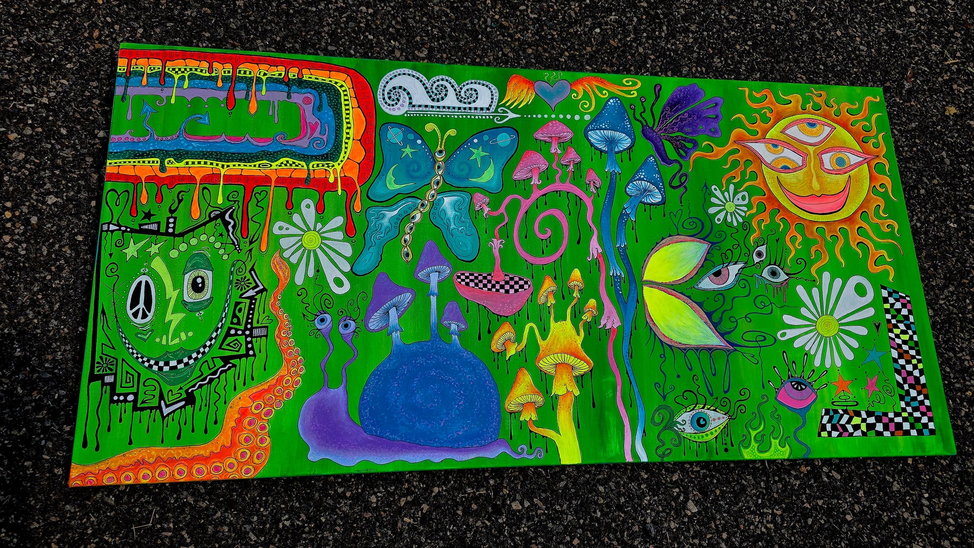 Colorful abstract artwork with various shapes and patterns on a canvas
