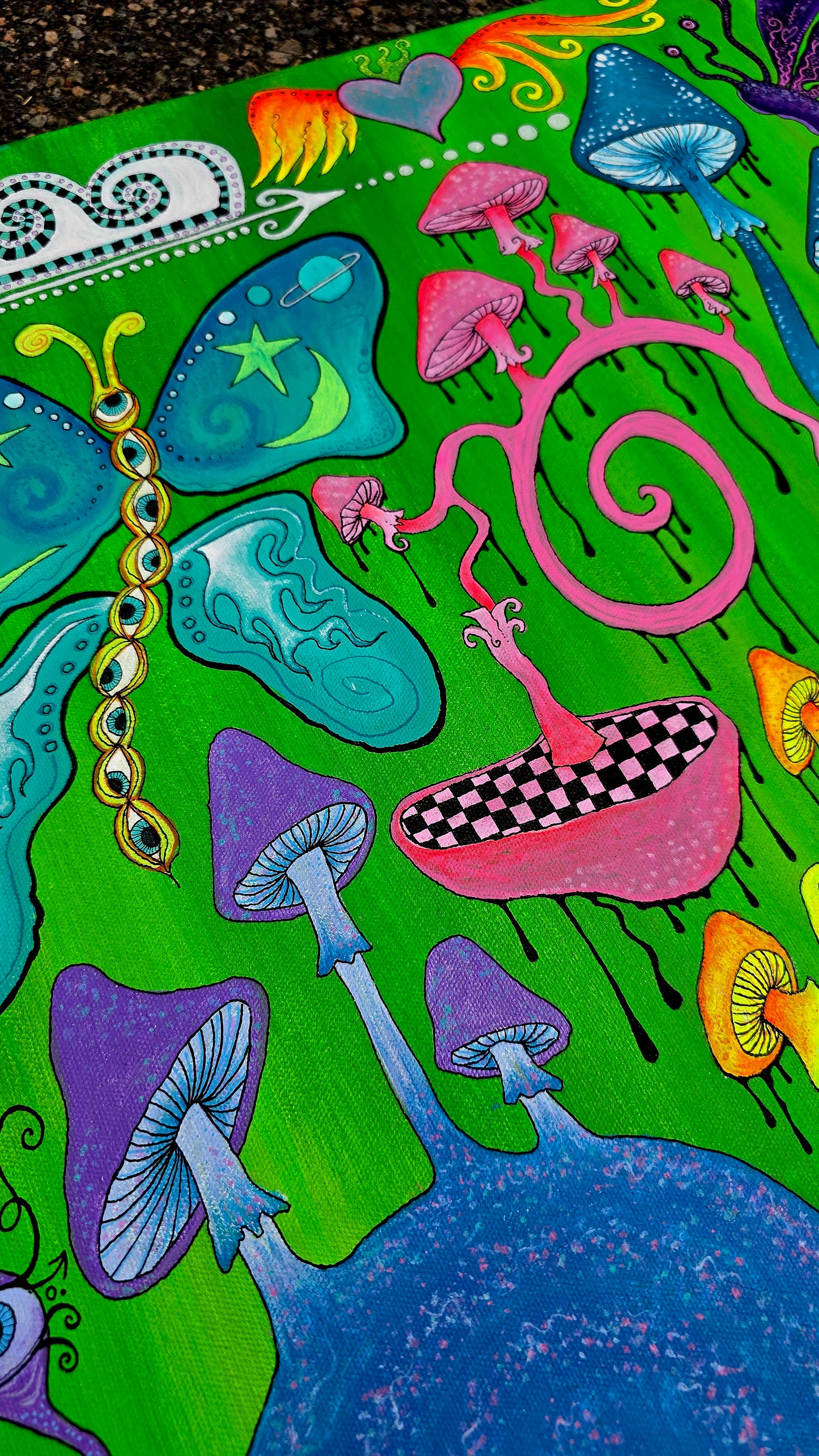 Colorful abstract design with mushrooms butterflies heart with wings on a green background